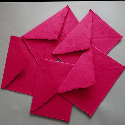 Magenta pink envelope with card