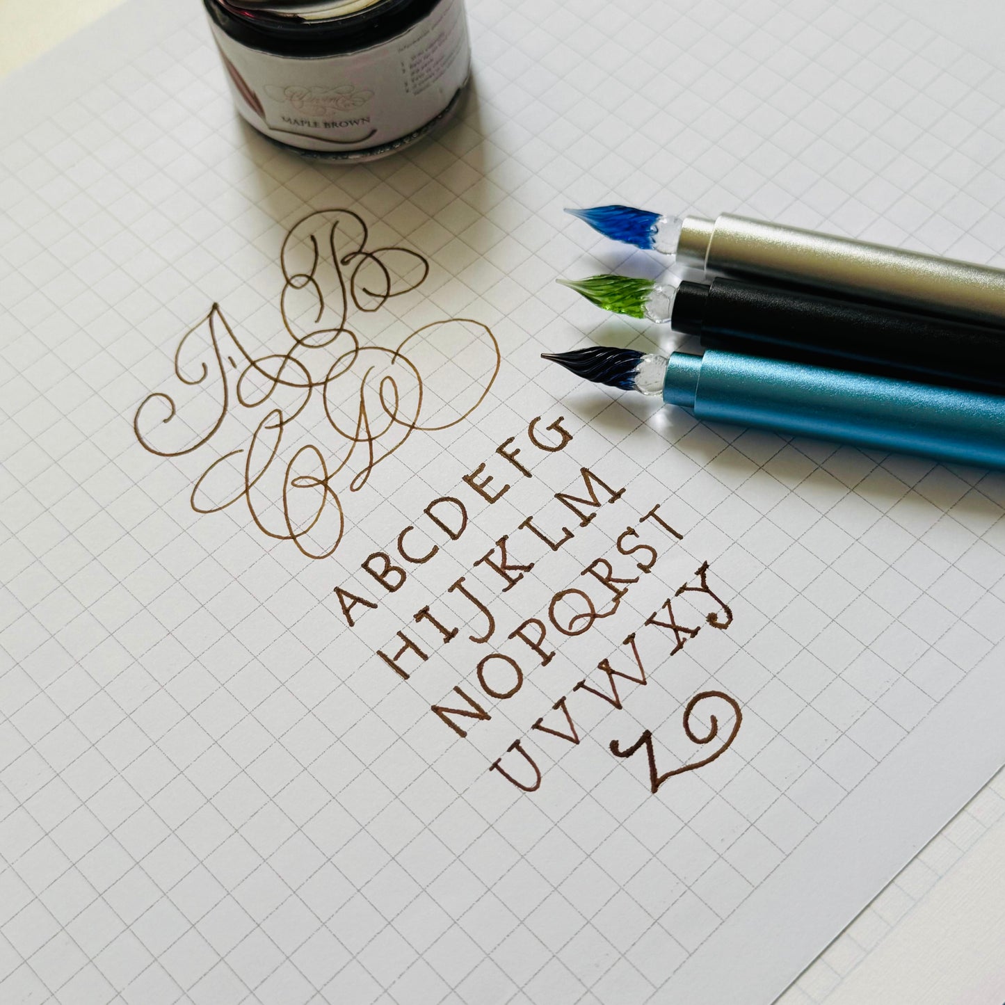 Glass pen metal body